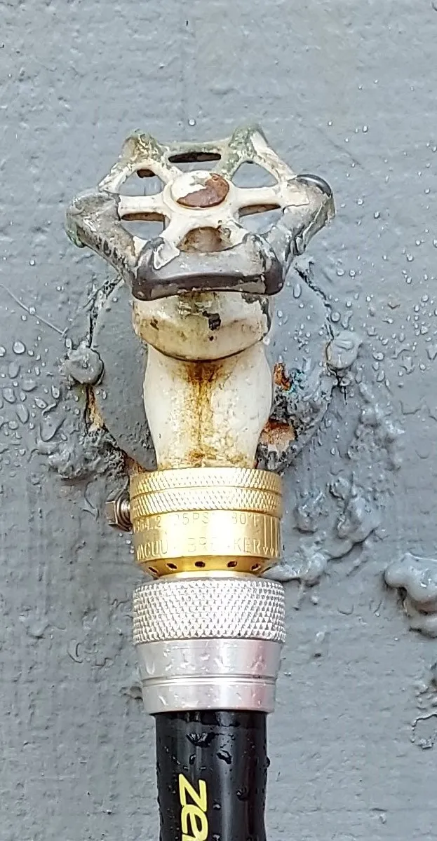 Add on spigot anti-siphon valve