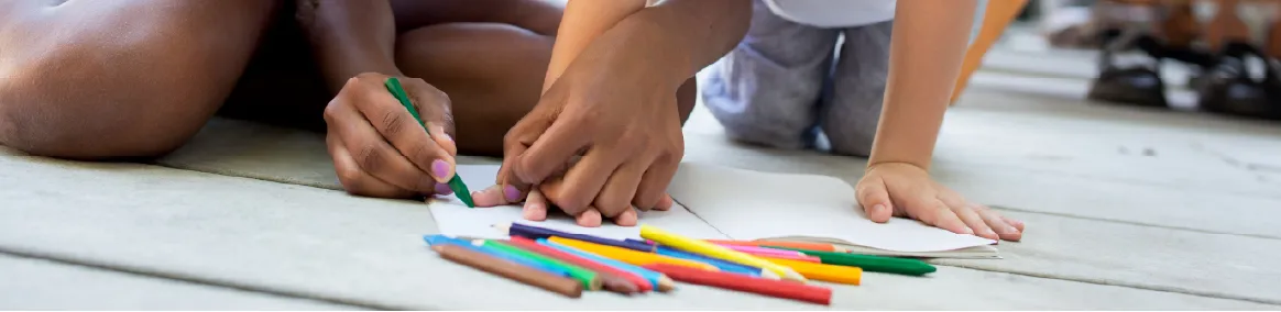 kids coloring together