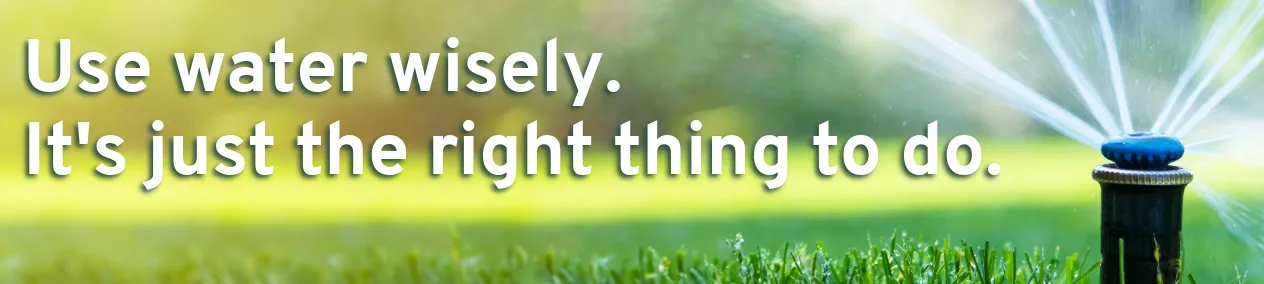 Photograph of a multi-stream rotator sprinkler watering a lawn with text, "Use water wisely. It's just the right thing to do."